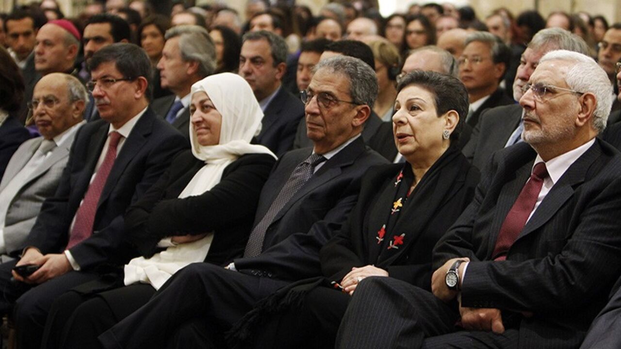 LEBANON/ From (R to L) Egyptian politician Abdel Moneim Aboul Fotouh, Palestinian politician Hanan Ashrawi, Egyptian politician Amr Moussa, Lebanese politician Bahia Hariri and Turkish Foreign Minister Ahmet Davutoglu attend the opening of the Reform and Transitions to Democracy conference in Beirut January 15, 2012. United Nations Secretary-General Ban Ki-moon told Syria's President Bashar al-Assad during the conference on Sunday to "stop killing your people" and the Syrian leader offered an amnesty for "crimes" co