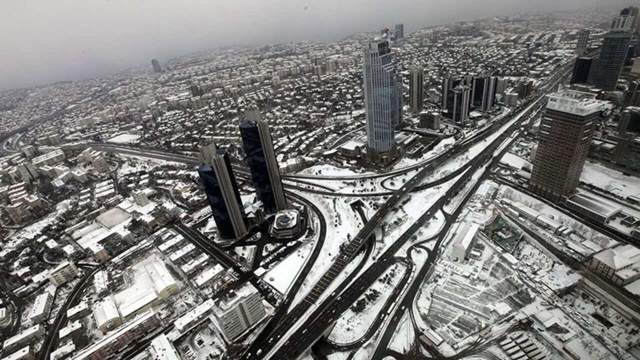 TURKEY/ Istanbul's financial district, Levent district, which comprises of leading Turkish companies' headquarters and popular shopping malls, is seen from the observation deck of Sapphire Tower in Istanbul January 30, 2012. The 261 metres high (285.4 yards) Sapphire Tower of Istanbul is the country's highest building. Picture was taken through glass. REUTERS/Murad Sezer (TURKEY - Tags: CITYSPACE BUSINESS) - RTR2X2RP