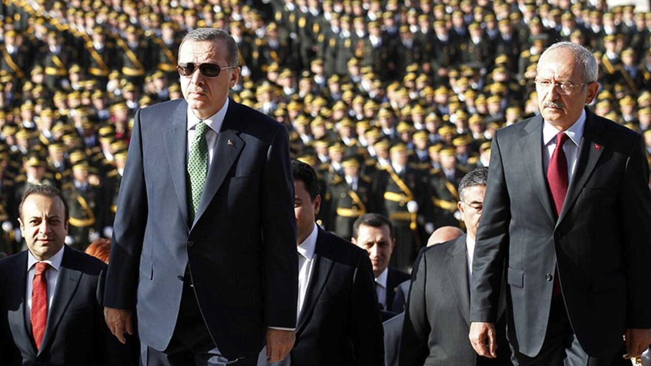 TURKEY Turkey's Prime Minister Tayyip Erdogan (2nd R) and leader of the main opposition Republican People's Party (CHP) Kemal Kilicdaroglu (R) attend an official ceremony to mark the 89th anniversary of Republic Day at Anitkabir in Ankara October 29, 2012. Anitkabir is the mausoleum of Mustafa Kemal Ataturk, founder of secular Turkey. REUTERS/Umit Bektas (TURKEY - Tags: POLITICS) - RTR39QHB