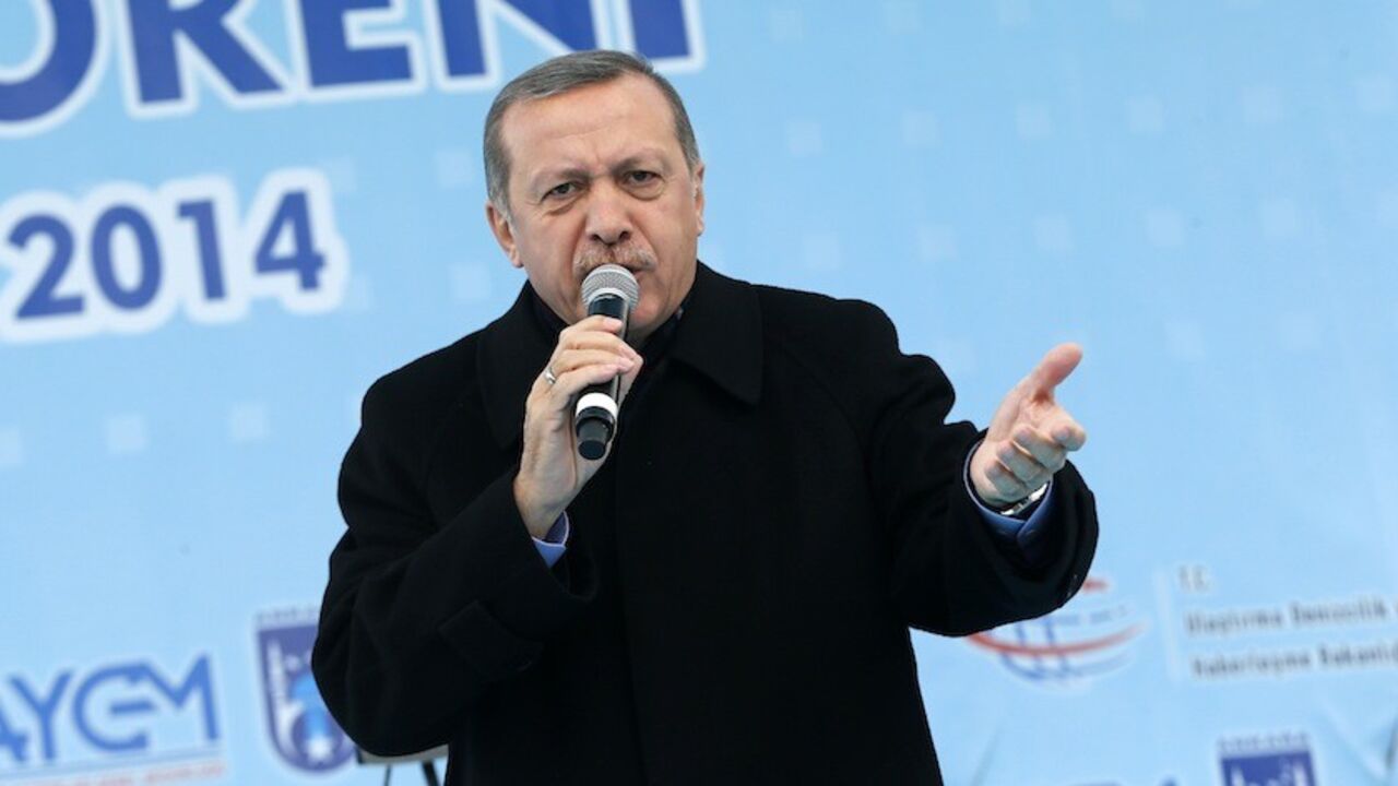 Turkey's PM Erdogan addresses crowd during opening ceremony of new metro line in Ankara Turkey's Prime Minister Tayyip Erdogan addresses the crowd during an opening ceremony of a new metro line in Ankara March 13, 2014. A defiant Prime Minister Tayyip Erdogan, already battling a damaging corruption scandal weeks ahead of elections, cast the latest unrest as part of a plot against the state. REUTERS/Umit Bektas (TURKEY - Tags: POLITICS TRANSPORT CIVIL UNREST) - RTR3GWD4