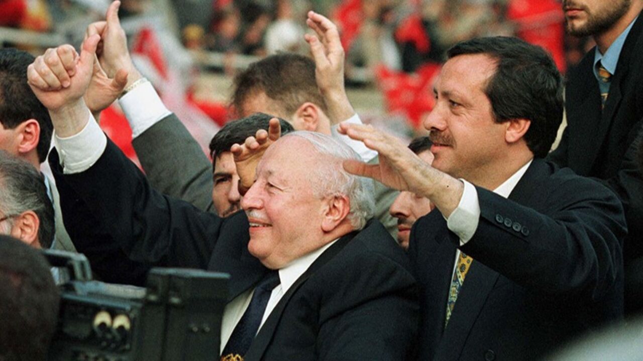 TURKISH PRIME MINISTER ERBAKAN WAVES TO SUPPORTERS WHO FETE OTTOMAN ISTANBUL CONQUEST Turkey's Islamist Prime Minister Necmettin Erbakan flanked by Istanbul Mayor Recep Tayyip Erdogan (R) gives a thumbs-up sign to the cheering 30,000-strong crowd gathered in Istanbul's central Inonu stadium May 29 to celebrate the 544th anniversary of the Ottoman conquest of Istanbul. Turkey's ruling Islamists said today no definite decision had been taken to go to early elections or hand over power to Foreign Minister Tansu Ciller in talks between the coalition allies to solve a political crisis.
TURKEY -