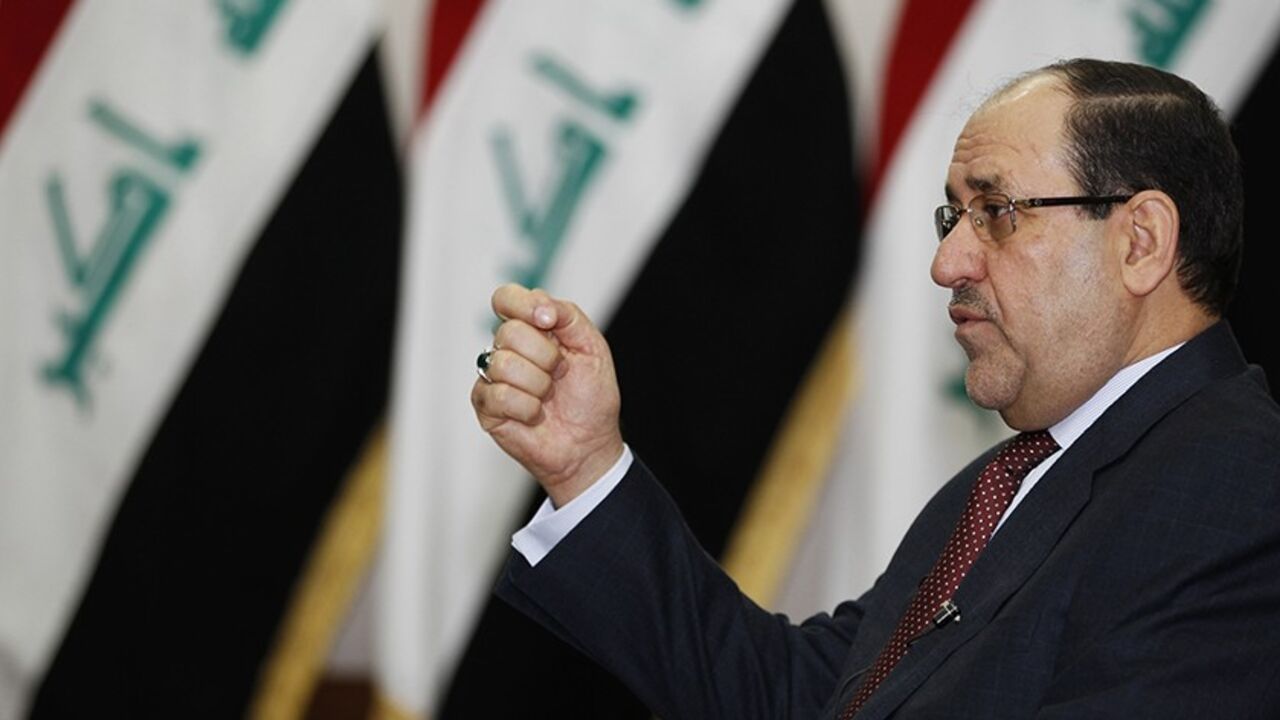 Iraq's Prime Minister Nuri al-Maliki speaks during an interview with Reuters in Baghdad January 12, 2014. Iraqi Prime Minister Nuri al-Maliki threatened on Sunday to cut central government funding for Iraq's autonomous Kurdistan region if the Kurds pursued a drive to pipe oil exports to Turkey without Baghdad's approval. The Kurdistan Regional Government said last week that crude had begun to flow to Turkey and exports were expected to start at the end of this month and then rise in February and March.    T