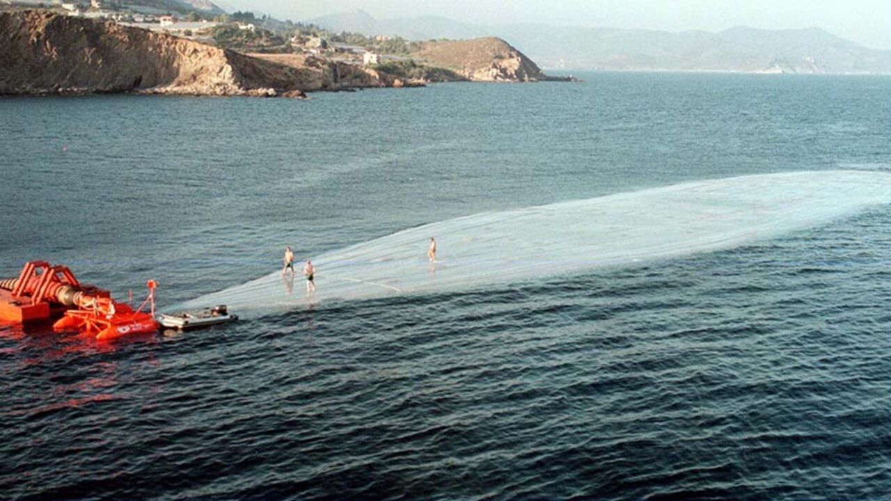 TURKEY Technicians stand on a water balloon as it is floated off Aydincik in the Mediterranean sea after it was filled with drinking water from Turkey July 15. The balloon is expected to reach to northern Cyprus coastline on July 16. The water ballon is dragged by a tug to test a planned method of supplying the drought-hit Northern Cyprus with drinking water. The giant ballons are 117.5 metre long, 23.3 metres wide and 5.6 metres high with a capacity of ten thousand cubic meters. - RTXI5YX