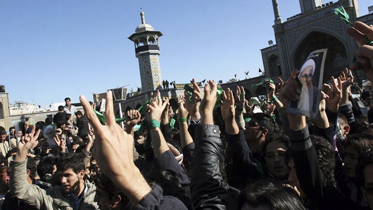 IRAN/ EDITORS' NOTE: Reuters and other foreign media are subject to Iranian restrictions on their ability to film or take pictures in Tehran.
Supporters of the Iranian opposition movement wear green during the funeral of Grand Ayatollah Hossein Ali Montazeri in the holy city of Qom December 21, 2009. Big crowds of mourners chanted anti-government slogans during the funeral of Iran's leading dissident cleric, Grand Ayatollah Hossein Ali Montazeri, in the holy city of Qom on Monday, websites reported. REUTERS/via