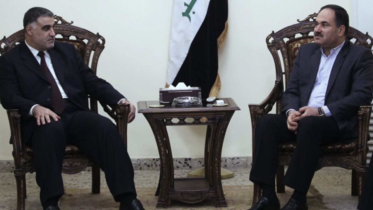 Iraq's Deputy Prime Minister Essawi meets with Shammari, head of the Iraqi Islamic al Fadila parliamentary bloc, in Baghdad Iraq's Deputy Prime Minister Rafi Essawi (R) meets with Hassan al-Shammari, head of the Iraqi Islamic al Fadila parliamentary bloc, in Baghdad October 1, 2010. REUTERS/Mohammed Ameen (IRAQ - Tags: POLITICS) - RTXSX67