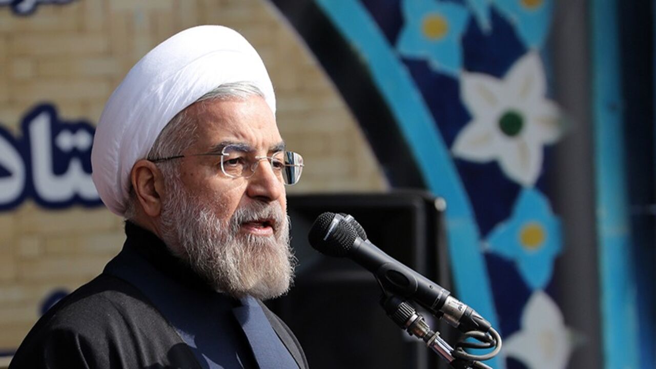 Nic6294755 Iranian President Hassan Rouhani delivers a speech during a rally in Tehran's Azadi Square (Freedom Square) to mark the 35th anniversary of the Islamic revolution on February 11, 2014. The 35th anniversary of the revolution that ousted the US-backed shah, comes as Tehran rides the wave of a landmark nuclear deal with major powers. AFP PHOTO/ATTA KENARE (Photo credit should read ATTA KENARE/AFP/Getty Images)