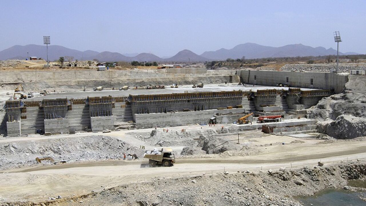 ETHIOPIA/ A general view shows construction activity on the Grand Renaissance dam in Guba Woreda, Benishangul Gumuz region March 16, 2014. Egypt fears the $4.7 billion dam, that the Horn of Africa nation is building on the Nile, will reduce a water supply vital for its 84 million people, who mostly live in the Nile valley and delta. Picture taken March 16, 2014. REUTERS/Tiksa Negeri (ETHIOPIA - Tags: ENERGY ENVIRONMENT POLITICS BUSINESS CONSTRUCTION) - RTR3HFQT