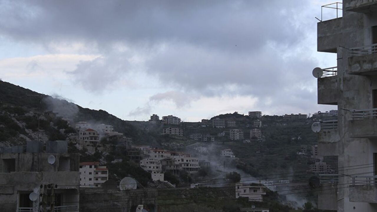 SYRIA-CRISIS/COAST Smoke rises after what activists said was shelling by forces loyal to Syria's President Bashar al-Assad in the Armenian Christian town of Kasab April 7, 2014. For three years, residents of Syria's Mediterranean provinces have watched from their coastal sanctuary as civil war raging further inland tore the country apart, killing tens of thousands of people and devastating historic cities. But a three-week-old offensive by rebel fighters in the north of Latakia province, a bastion of Assad's Alawite minority,
