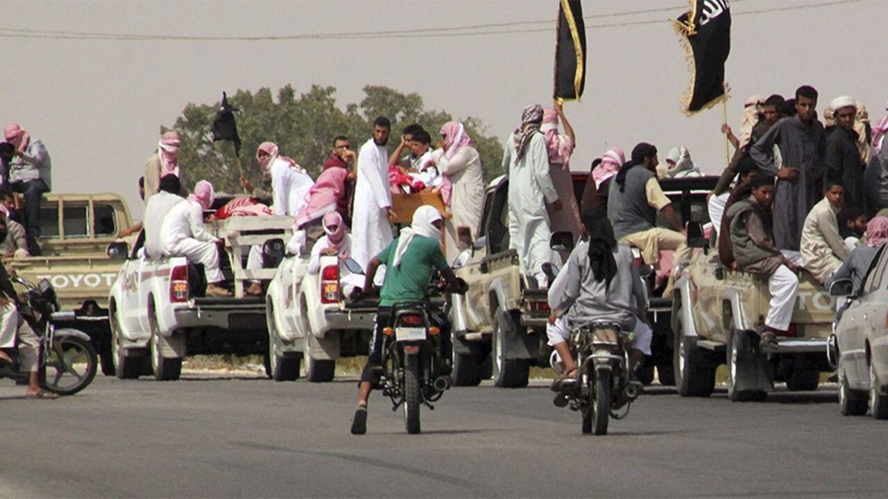 EGYPT-ISRAEL/DRONE A funeral convoy carrying the bodies of four Islamist militants, drives through Sheikh Zuweid, in the north of the Sinai peninsula August 10, 2013. The four Islamist militants were killed by an air strike that their comrades said had been done by an Israeli drone but which state media said was the work of an Egyptian army helicopter. REUTERS/ Stringer (EGYPT - Tags: CIVIL UNREST POLITICS) - RTX12G57