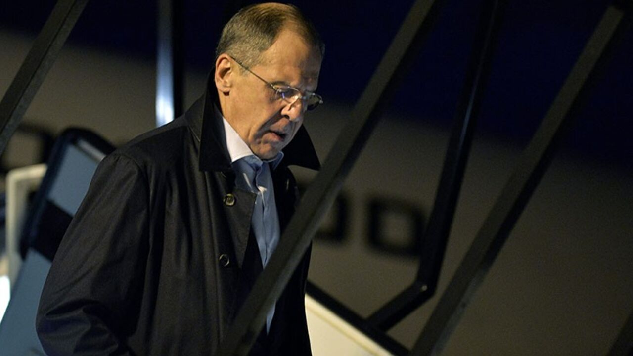 IRAN-NUCLEAR/ Russia's Foreign Minister Sergey Lavrov arrives at the airport in Geneva, to join talks over Iran's nuclear programme, November 22, 2013. Iran and six world powers struggled on Friday, after two days of talks, to overcome stumbling blocks to an interim deal under which Tehran would curb its contested nuclear programme in exchange for some relief from economic sanctions. REUTERS/Martial Trezzini/Pool (SWITZERLAND - Tags: POLITICS) - RTX15OXQ