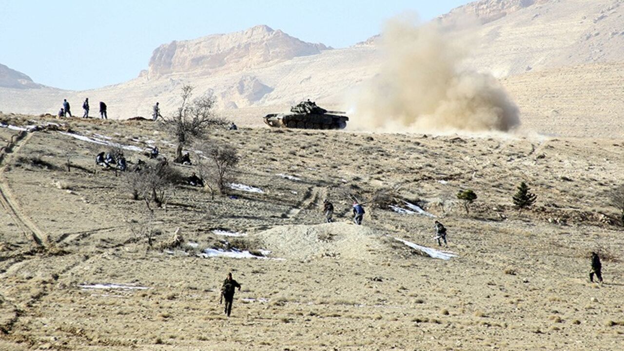 SYRIA-CRISIS/AMBUSH Forces loyal to Syria's President Bashar al-Assad are seen in the Qalamoun mountains north of Damascus, in this handout photograph distributed by Syria's national news agency SANA on December 27, 2013. Syria's army ambushed Islamist fighters in the Qalamoun mountains north of the capital Damascus on Friday, leaving as many as 60 people dead, the Syrian Observatory for Human Rights said. The attack happened between the Christian town of Maaloula and the town of Yabroud, where government forces and rebels are