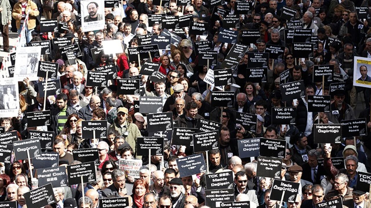 Journalists and activists participate in a rally calling for press freedom in central Ankara March 19, 2011. The recent arrest and jailing of some 10 journalists as part of investigations into Ergenekon, an ultra-nationalist, secularist network opposed to Prime Minister's Tayyip Erdogan's rule, has a triggered expressions of concern from the European Union, the U.S. and human rights groups about Ankara's commitment to media freedom and democratic principles. REUTERS/Umit Bektas (TURKEY - Tags: CIVIL UNREST 