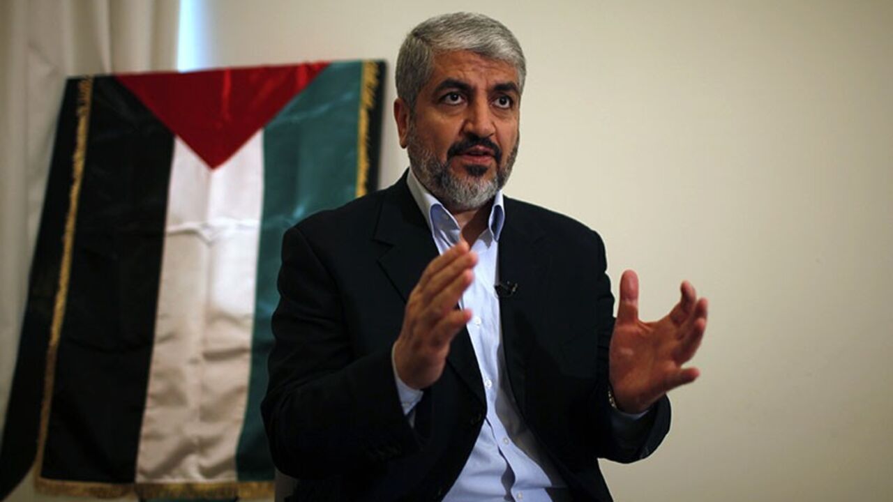PALESTINIANS-MESHAAL/ Hamas leader Khaled Meshaal speaks during his interview with Reuters in Doha November 29, 2012. Meshaal said the de facto recognition of a sovereign Palestinian state won by his rival Mahmoud Abbas should be seen alongside Gaza's latest conflict with Israel as a single, bold strategy that could empower all Palestinians. Meshaal said the short war which claimed 162 Palestinian lives and five Israelis was concluded on terms set by the Palestinian Islamist movement and ended its isolation, creating a new mood