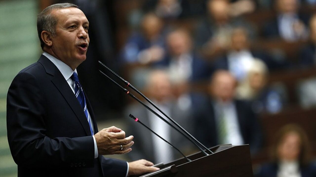 TURKEY-ERDOGAN/ Turkey's Prime Minister Tayyip Erdogan addresses members of parliament from his ruling AK Party (AKP) during a meeting at the Turkish parliament in Ankara April 29, 2014. REUTERS/Umit Bektas (TURKEY - Tags: POLITICS) - RTR3N1Z0