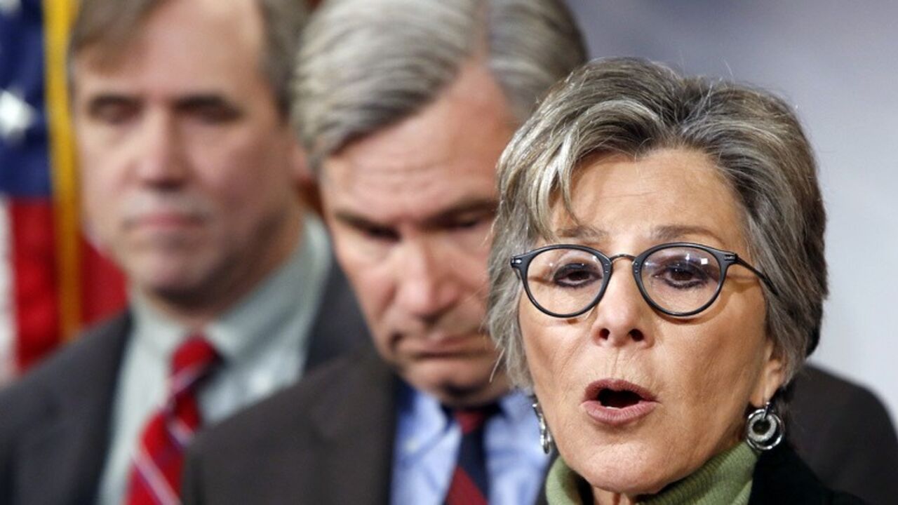 Boxer leads a news conference to draw attention to climate change at the U.S. Capitol in Washington U.S. Senator Barbara Boxer (D-CA) leads a news conference to draw attention to climate change at the U.S. Capitol in Washington, January 14, 2014. Also pictured are U.S. Senator Jeff Merkley (D-OR) (L) and Senator Sheldon Whitehouse (D-RI) (2nd L). REUTERS/Jonathan Ernst (UNITED STATES - Tags: POLITICS ENVIRONMENT) - RTX17E1Y