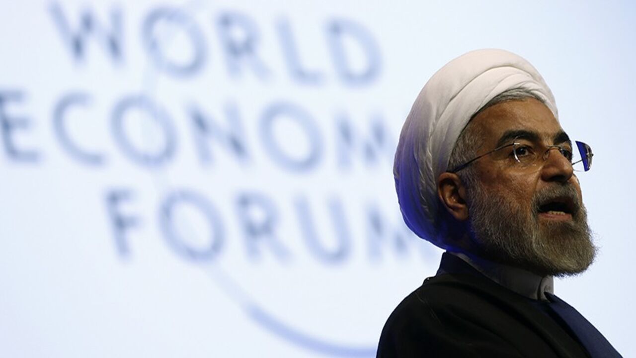 DAVOS/ Iran's President Hassan Rouhani speaks during a session at the annual meeting of the World Economic Forum (WEF) in Davos January 23, 2014. REUTERS/Denis Balibouse (SWITZERLAND - Tags: POLITICS BUSINESS HEADSHOT) - RTX17QZY