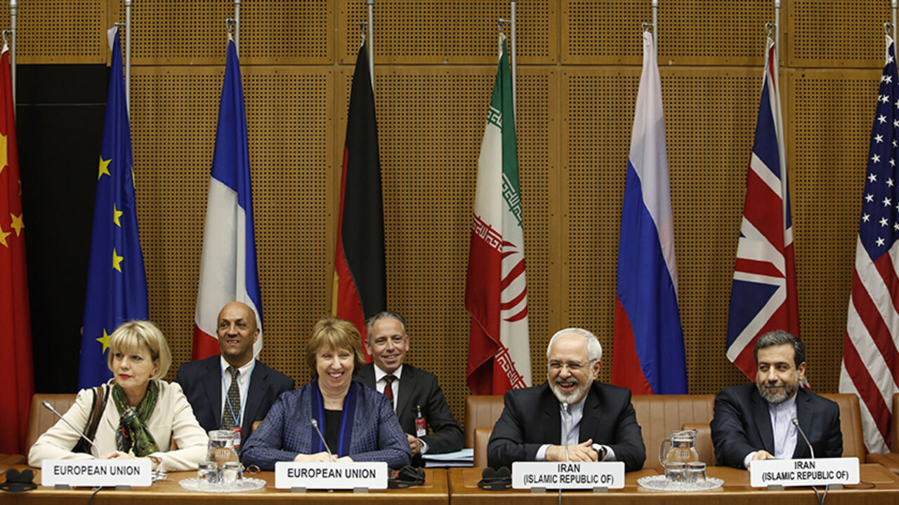 - (L to R) EU Deputy Secretary General Helga Schmid, Vice President of the European Commission Catherine Margaret Ashton, Iranian Foreign Minister Mohammad Javad Zarif and Iranian ambassador to Austria Hassan Tajik attend the so called EU 5+1 Talks with Iran at the UN headquarters in Vienna, on June 17, 2014. The United States and Iran briefly discussed the crisis in Iraq on the sidelines of a critical fifth round of nuclear talks in Vienna, US officials said on June 16, 2014. AFP PHOTO / DIETER NAGL