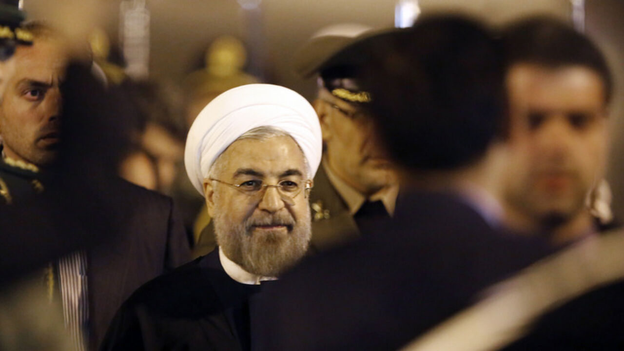 Iran's President Hassan Rouhani arrives at Pudong International Airport, ahead of the fourth CICA summit in Shanghai Iran's President Hassan Rouhani arrives at Pudong International Airport, ahead of the fourth Conference on Interaction and Confidence Building Measures in Asia (CICA) summit in Shanghai May 20, 2014. REUTERS/Carlos Barria (CHINA - Tags: POLITICS) - RTR3Q000