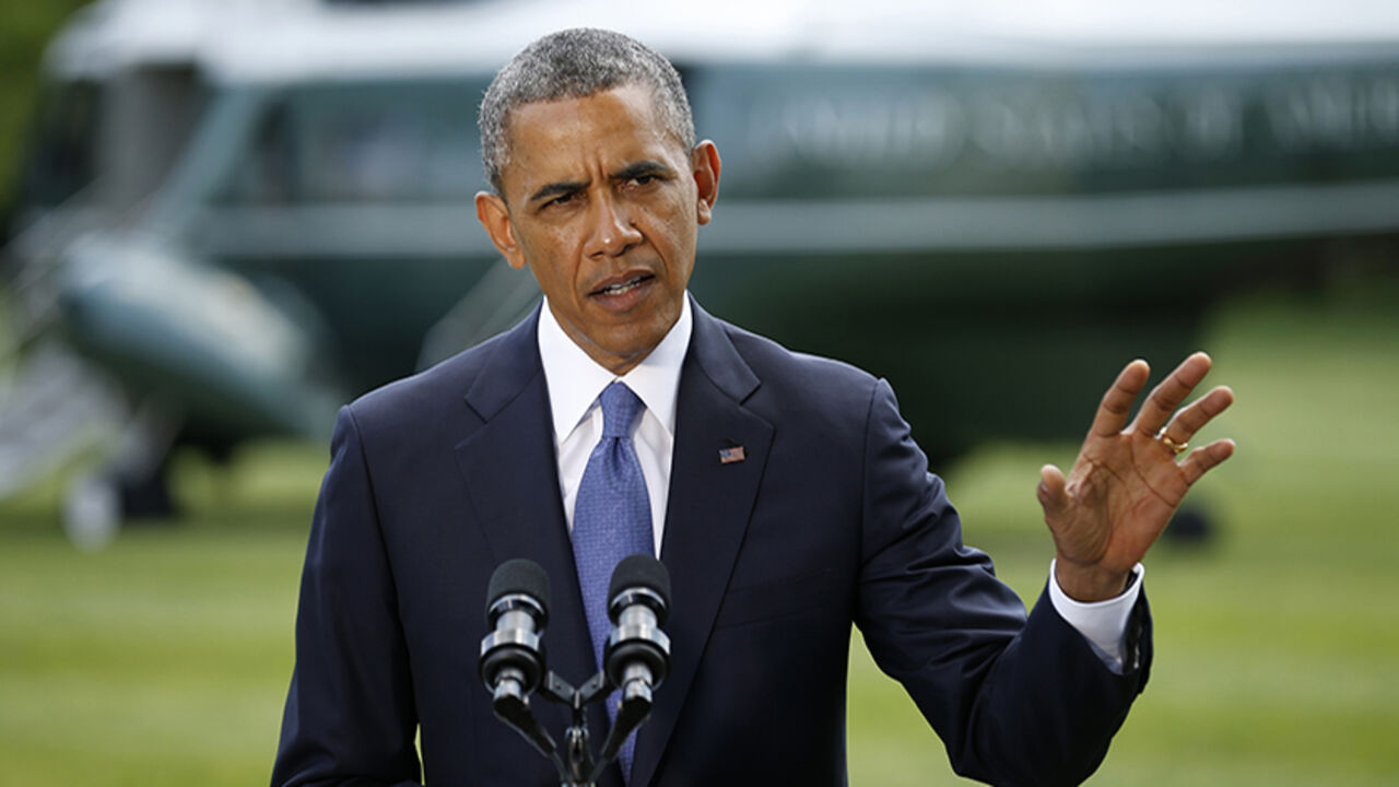 U.S. President Obama speaks about the situation in Iraq at the White House U.S. President Barack Obama speaks about the situation in Iraq from the South Lawn of the White House in Washington June 13, 2014. Obama said on Friday he will take several days to review options for how the United States can help Iraq deal with a militant insurgency, saying any action would need significant involvement by Iraq itself. REUTERS/Kevin Lamarque (UNTIED STATES - Tags: POLITICS) - RTR3TNFS