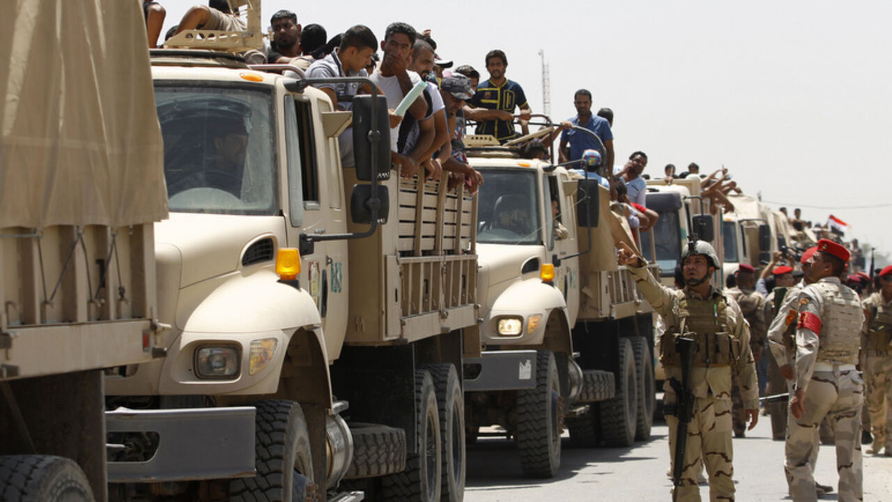 Volunteers who have joined the Iraqi Army to fight against the predominantly Sunni militants travel in army trucks in Baghdad Volunteers, who have joined the Iraqi Army to fight against the predominantly Sunni militants who have taken over Mosul and other Northern provinces, travel in army trucks in Baghdad June 14, 2014. Iraqi Prime Minister Nuri al-Maliki told army officers in the city of Samarra that volunteers were arriving to help defeat Islamist militants who have swept through Sunni Muslim territory towards Baghdad. REUTERS/Thaier Al-Sudani (IRAQ - Tags: CIVIL UNREST POLITICS MILITARY) - RTR3TQL8