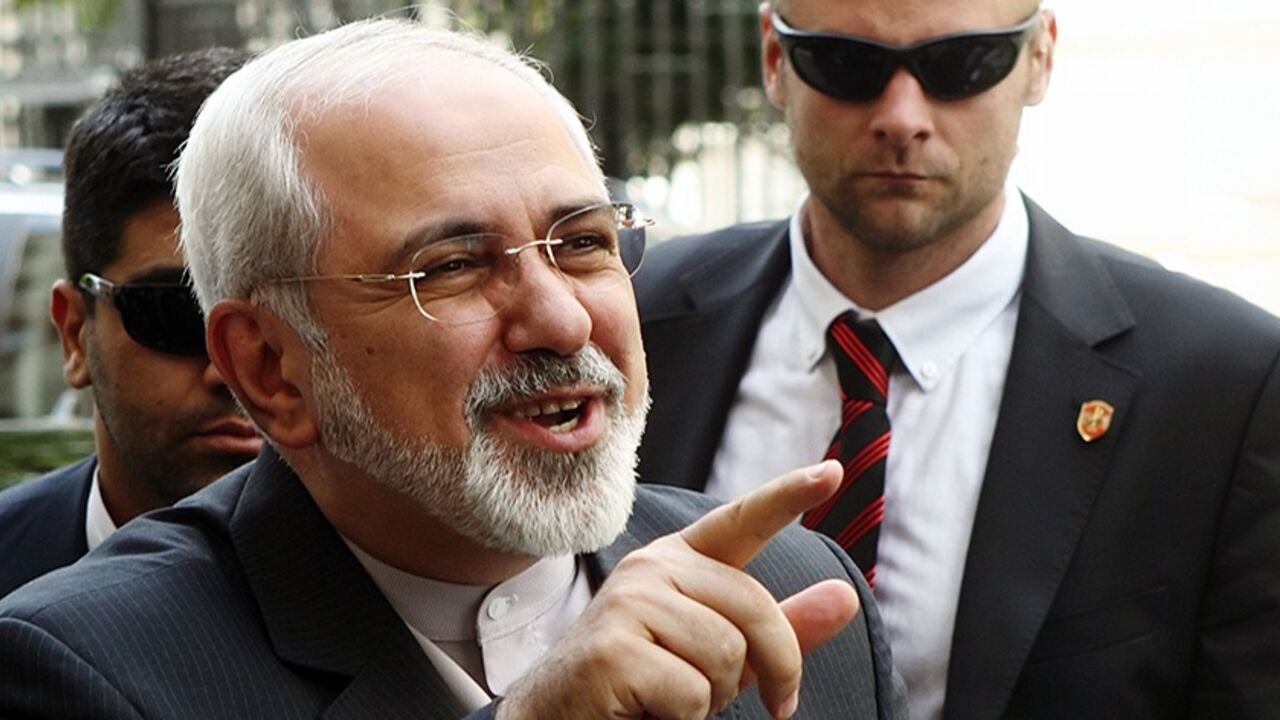 Iranian Foreign Minister Mohammad Javad talks to journalists as he arrives at his embassy in Vienna Iranian Foreign Minister Mohammad Javad Zarif talks to journalists as he arrives at his embassy in Vienna June 16, 2014. Zarif is in Vienna for a new round of talks between world powers and Iran on Tehran's contested nuclear programme. REUTERS/Heinz-Peter Bader (AUSTRIA - Tags: POLITICS ENERGY) - RTR3U1EB