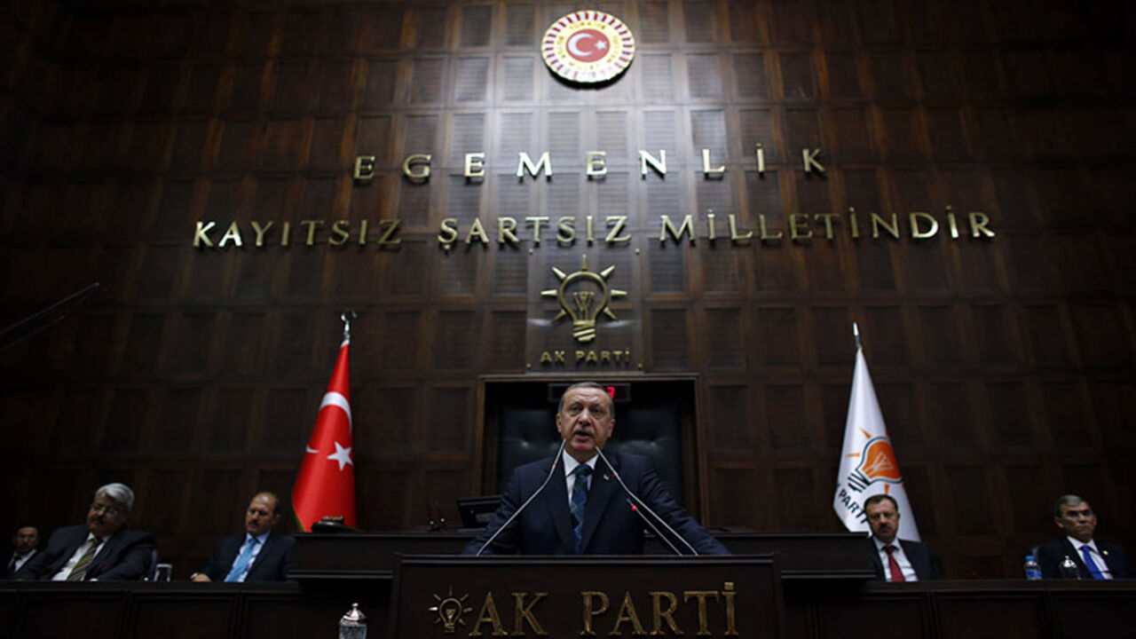 Turkey's Prime Minister Tayyip Erdogan addresses members of parliament from his ruling AK Party during a meeting at the Turkish parliament in Ankara Turkey's Prime Minister Tayyip Erdogan addresses members of parliament from his ruling AK Party (AKP) during a meeting at the Turkish parliament in Ankara June 17, 2014. REUTERS/Umit Bektas (TURKEY - Tags: POLITICS) - RTR3U7T5