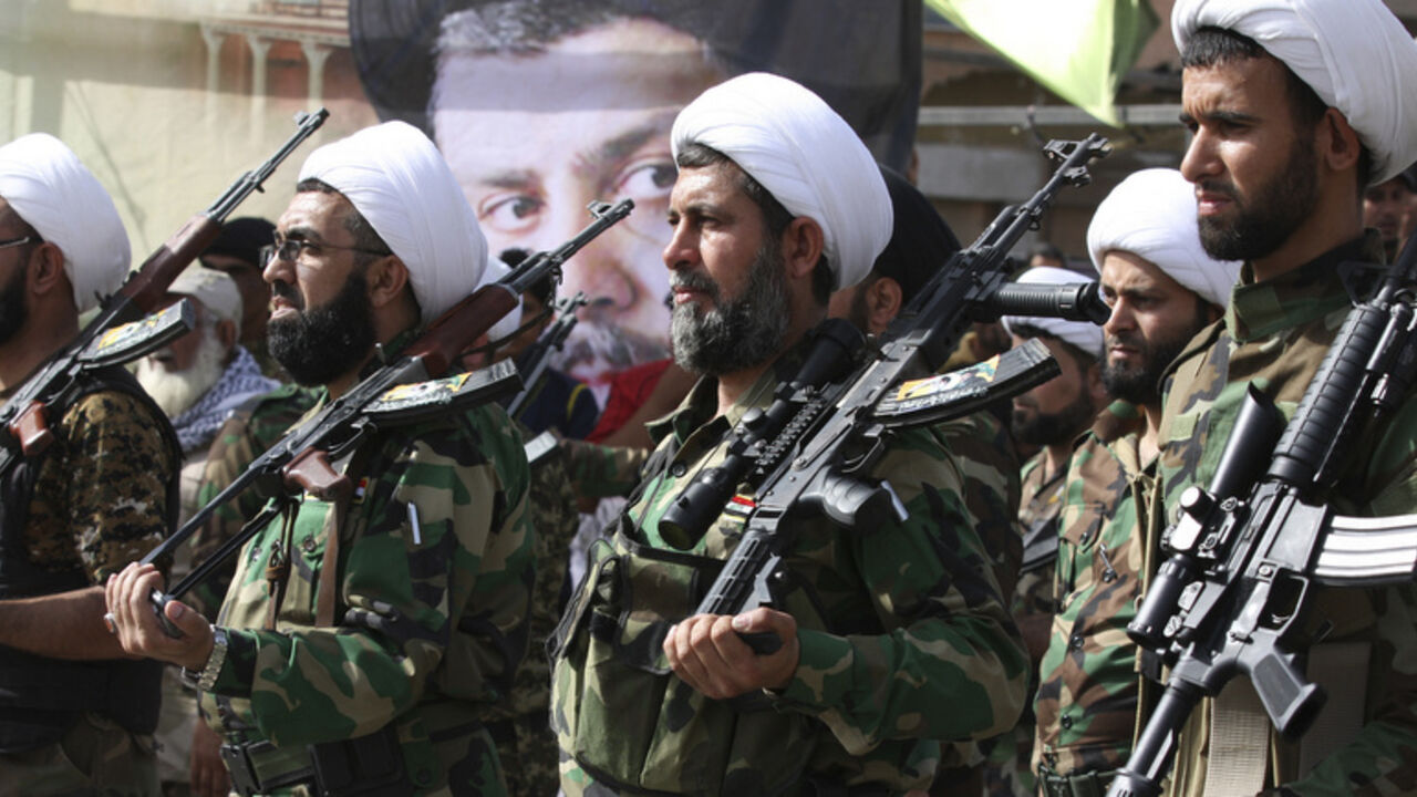 Mehdi Army fighters loyal to Shi'ite cleric Moqtada al-Sadr march during a parade in Baghdad Mehdi Army fighters loyal to Shi'ite cleric Moqtada al-Sadr march during a parade in Baghdad's Sadr city, June 21, 2014. Iraq's senior Shi'ite religious cleric Moqtada al-Sadr issued a call for unity, saying Shi'ites and Sunnis should rally behind the authorities to prevent the Sunni militant Islamic State of Iraq and the Levant from destroying the country. REUTERS/Wissm al-Okili (IRAQ - Tags: CIVIL UNREST POLITICS MILITARY) - RTR3UZ9R