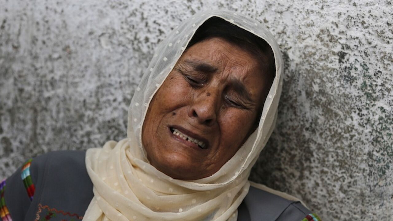 The mother of Palestinian Mohammed Attallah mourns his death at a hospital in the West Bank city of Ramallah The mother of Palestinian Mohammed Attallah mourns his death at a hospital in the West Bank city of Ramallah June 22, 2014. Israeli troops killed two Palestinians on Sunday, one of them Attallah, Palestinian medics and a militant group said, as Israel pressed on with its crackdown on Hamas, the Islamist group it accuses of abducting three Israeli teens. In Ramallah, the Islamic Jihad militant group said one of its members was killed by Israeli gunfire.The Israeli military said it was "not familiar" with th