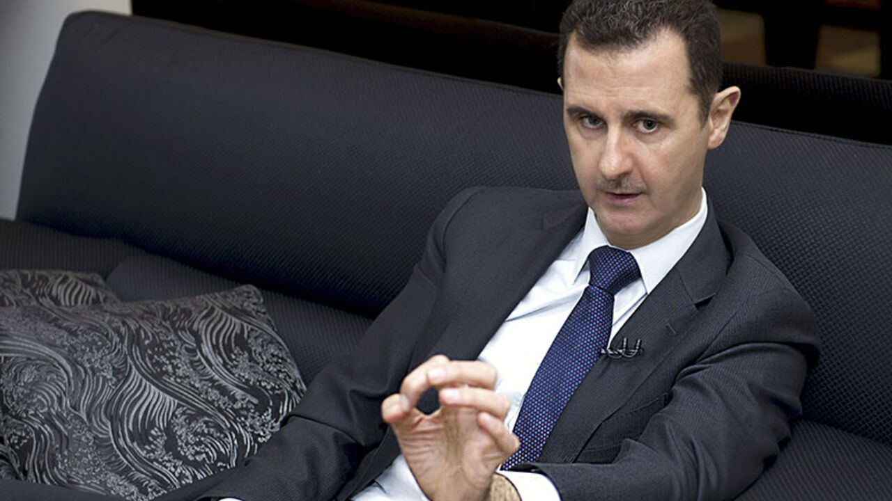 Syria's President Bashar al-Assad speaks during an interview with a German newspaper in Damascus Syria's President Bashar al-Assad speaks during an interview with a German newspaper in Damascus, in this handout photograph distributed by Syria's national news agency SANA, June 17, 2013 . Europe will "pay the price" if it delivers arms to rebel forces in Syria, Assad said. REUTERS/SANA/Handout via Reuters (SYRIA - Tags: POLITICS CONFLICT) ATTENTION EDITORS - THIS IMAGE WAS PROVIDED BY A THIRD PARTY. FOR EDITORIAL USE ONLY. NOT FOR SALE FOR MARKETING OR ADVERTISING CAMPAIGNS. THIS PICTURE IS DISTRIBUTED E