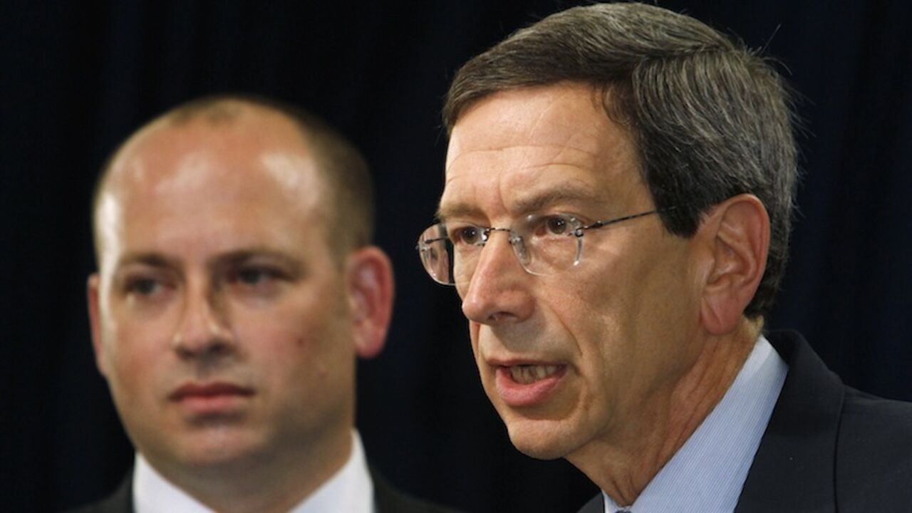 U.S. special adviser for nonproliferation and arms control, Einhorn speaks as Glaser, the Treasury Department's deputy assistant secretary for terrorist financing and financial crimes looks on during a news conference in Seoul U.S. special adviser for nonproliferation and arms control, Robert Einhorn (R) speaks as Daniel Glaser, the Treasury Department's deputy assistant secretary for terrorist financing and financial crimes looks on during a news conference at the Information Resource Center of the U.S. Embassy in Seoul August 2, 2010. REUTERS/Truth Leem (SOUTH KOREA - Tags: POLITICS MILITARY BUSINESS) - RTR2GZAI