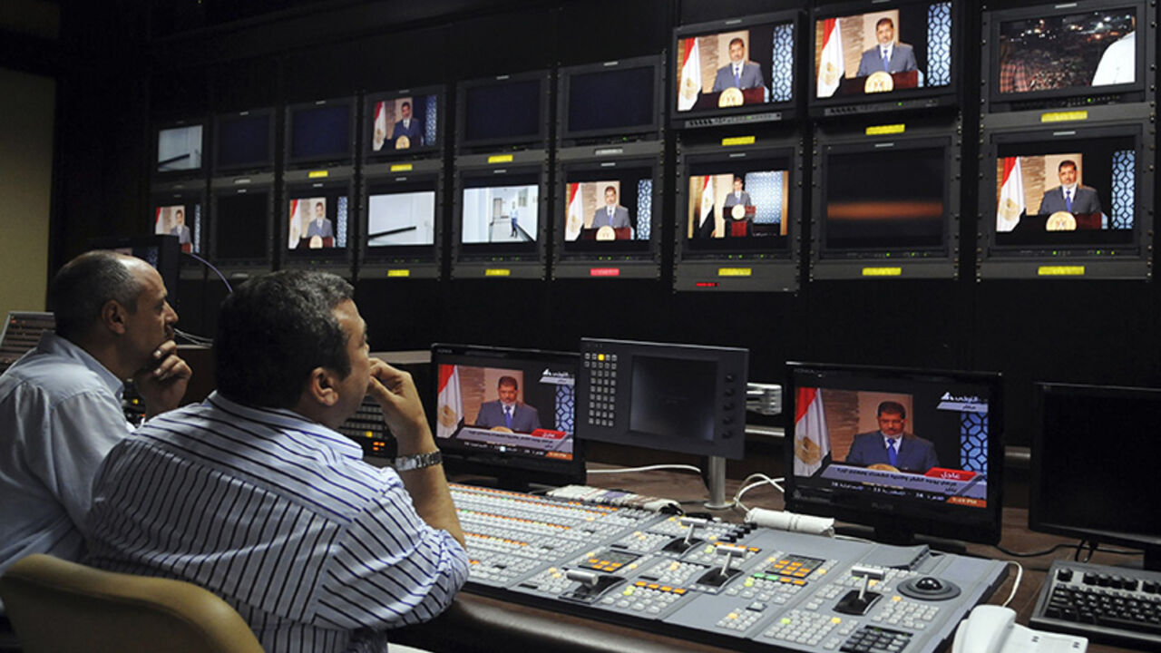Muslim Brotherhood's President-elect Morsy is seen on screens at the Egyptian Television headquarters control room during his first televised address to the nation in Cairo Muslim Brotherhood's President-elect Mohamed Morsy is seen on screens at the Egyptian Television headquarters control room during his first televised address to the nation in Cairo June 24, 2012. Morsy's victory in Egypt's presidential election takes the Muslim Brotherhood's long power struggle with the military into a new round that will be fought inside the institutions of state themselves and may force new compromises on the Islamists. Picture taken June 24, 2012. To match Analysis EGYPT-ELECTION/STRUGGL
