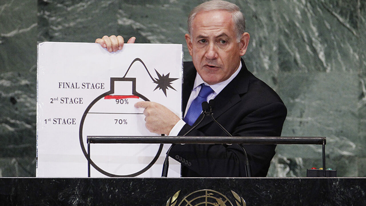 Israel's Prime Minister Netanyahu points to red line he has drawn on graphic of bomb used to represent Iran's nuclear program in New York Israel's Prime Minister Benjamin Netanyahu points to a red line he has drawn on a graphic of a bomb used to represent Iran's nuclear program as he addresses the 67th United Nations General Assembly at the U.N. Headquarters in New York, September 27, 2012. The red line he drew represents a point where he believes, the international community should tell Iran that they will not be allowed to pass without intervention. REUTERS/Lucas Jackson (UNITED STATES - Tags: POLITICS) - RTR38I72