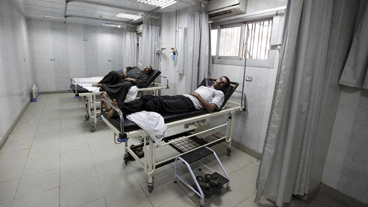 Patients wait to see a doctor at Al-Moniera public hospital in Cairo Patients wait to see a doctor at Al-Moniera public hospital in Cairo October 2, 2012. Egypt's doctors began a partial strike on Monday with varied demands, including making the health budget 15 percent of the state budget, and improving security conditions to protect doctors and patients from assaults, said representatives from the Doctors' Syndicate. REUTERS/Amr Abdallah Dalsh (EGYPT - Tags: POLITICS CIVIL UNREST BUSINESS EMPLOYMENT HEALTH) - RTR38P11