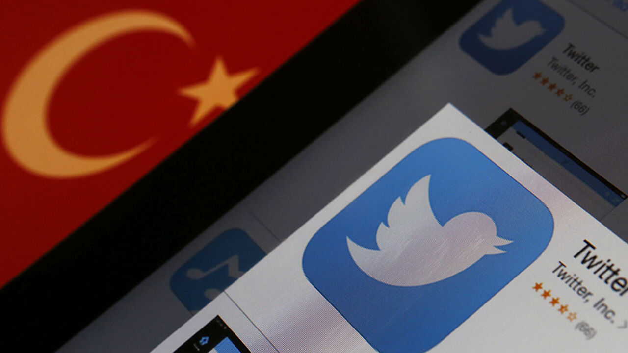 Photo illustration of Twitter logo on an iPad display next to a Turkish flag A Twitter logo on an iPad display is pictured next to a Turkish flag in this photo illustration taken in Istanbul March 21, 2014. Turkey's courts have blocked access to Twitter a little over a week before elections as Prime Minister Tayyip Erdogan battles a corruption scandal that has seen social media awash with alleged evidence of government wrongdoing. The ban came hours after a defiant Erdogan, on the campaign trail ahead of key March 30 local elections, vowed to "wipe out" Twitter and said he did not c