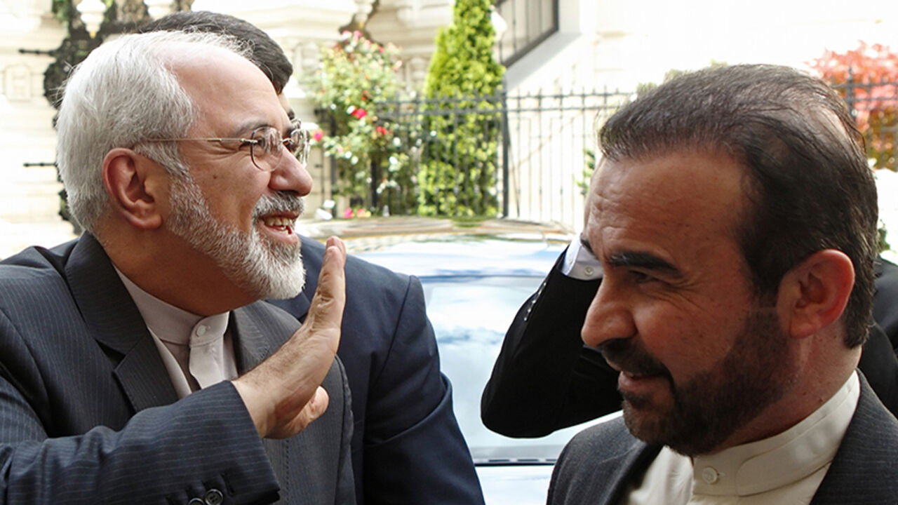 Iranian Foreign Minister Mohammad Zarif and Iranian Ambassador to the IAEA Najafi arrive at their embassy in Vienna Iranian Foreign Minister Mohammad Javad Zarif (L) and Iranian Ambassador to the International Atomic Energy Agency (IAEA) Reza Najafi arrive at their embassy in Vienna June 16, 2014. Zarif is in Vienna for a new round of talks between world powers and Iran on Tehran's contested nuclear programme. REUTERS/Heinz-Peter Bader (AUSTRIA - Tags: POLITICS ENERGY) - RTR3U1FC