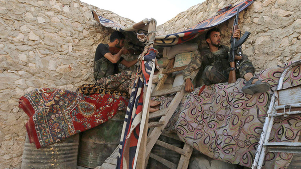 Free Syrian Army fighters sit in a shelter in Aleppo's Sheikh Najjar Free Syrian Army fighters sit in a shelter in Aleppo's Sheikh Najjar July 8, 2014. Picture taken July 8, 2014.
REUTERS/Hosam Katan (SYRIA - Tags: POLITICS CIVIL UNREST CONFLICT) - RTR3XRRZ