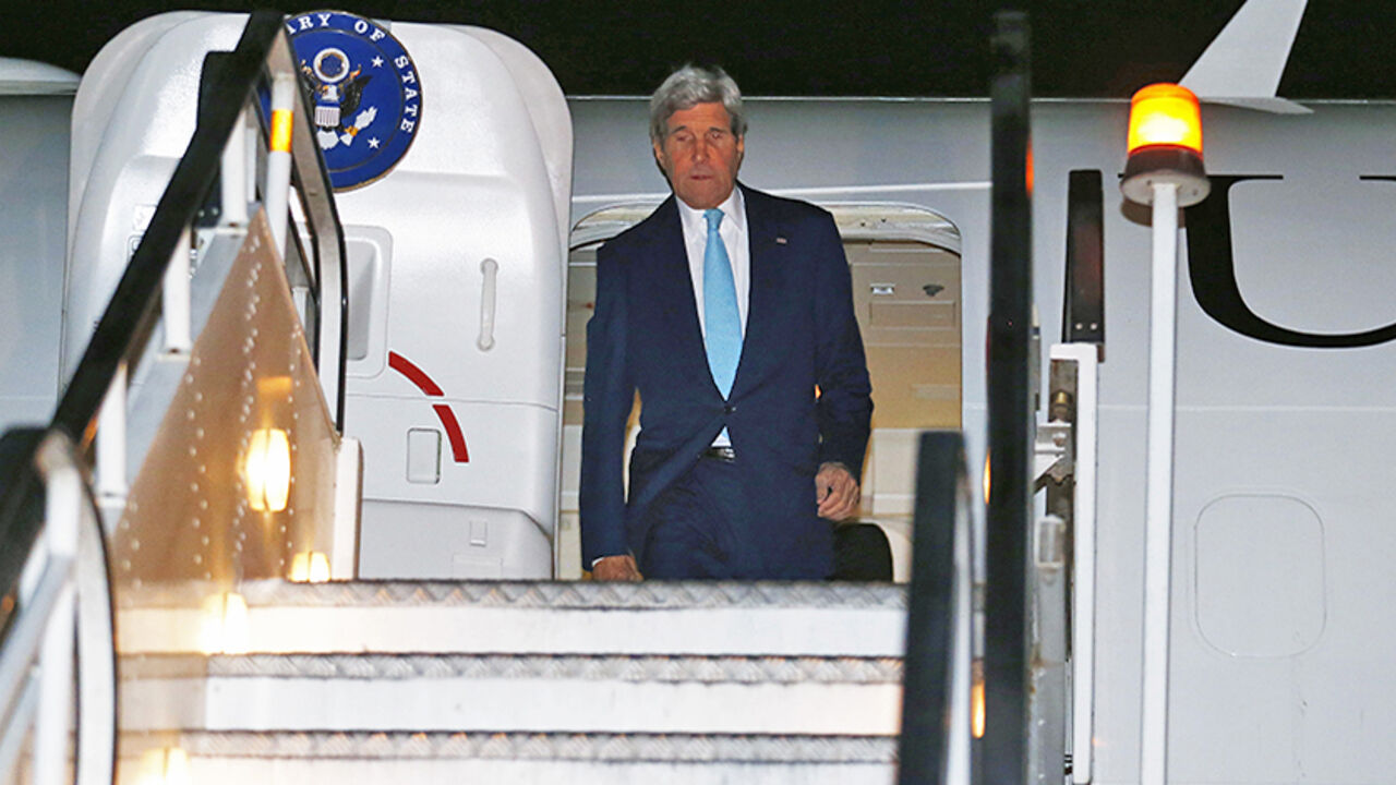 U.S. Secretary of State John Kerry disembarks from his aircraft after arriving at Kabul International Airport U.S. Secretary of State John Kerry disembarks from his aircraft after arriving at Kabul International Airport in Kabul, July 11, 2014. Kerry is expected to meet with Afghanistan's President Kharzai as well as both candidates in Afghanistan's recent presidential election. REUTERS/Jim Bourg (AFGHANISTAN - Tags: POLITICS) - RTR3Y34K