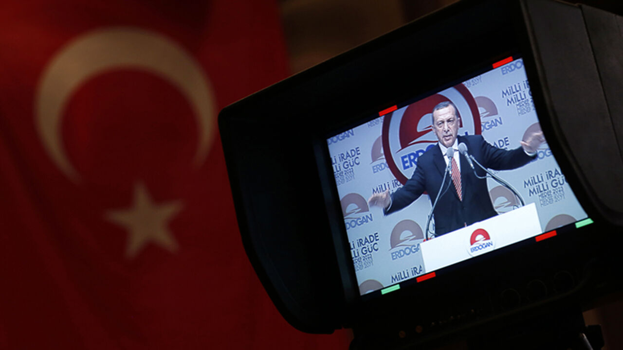 Turkey's Prime Minister and presidential candidate Tayyip Erdogan is seen through a camera monitor as he makes a speech during a meeting to launch his election campaign in Istanbul Turkey's Prime Minister and presidential candidate Tayyip Erdogan is seen through a camera monitor as he makes a speech during a meeting to launch his election campaign in Istanbul July 11, 2014. REUTERS/Murad Sezer (TURKEY - Tags: POLITICS ELECTIONS) - RTR3Y71D