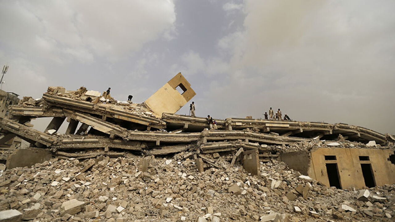 People look through the wreckage of the headquarters of Yemen's Islamist Islah party in the northwestern city of Amran People look through the wreckage of the headquarters of Yemen's Islamist Islah party in the northwestern city of Amran July 14, 2014. According to local media, the five-story building was bombed by Shi'ite Muslim tribesmen known as Houthis during recent fighting against army forces in Amran, and there were no casualties. Yemen's president on Sunday demanded the withdrawal of Shi'ite Muslim tribesmen from the provincial city of Amran captured on July 8, in a stand-off that threatens to intensify turmoil in t
