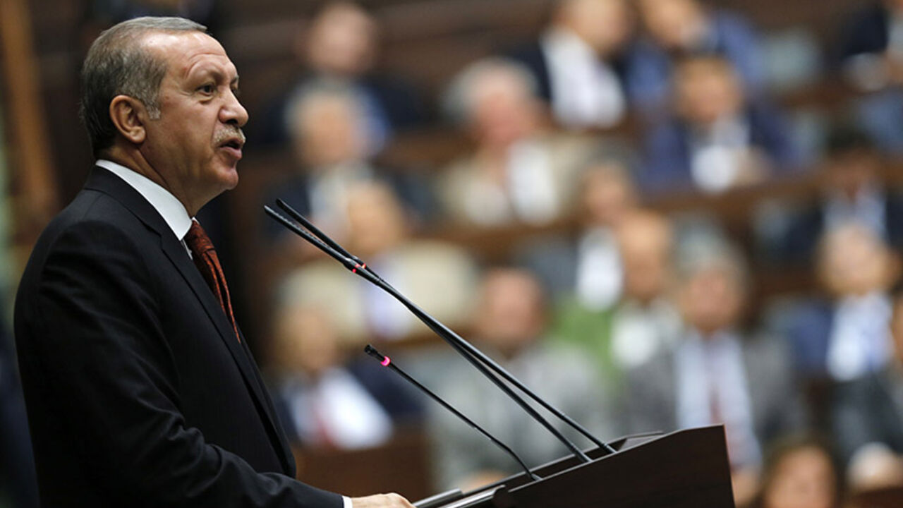 Turkey's Prime Minister Tayyip Erdogan addresses members of parliament from his ruling AK Party during a meeting in Ankara Turkey's Prime Minister Tayyip Erdogan addresses members of parliament from his ruling AK Party (AKP) during a meeting at the Turkish parliament in Ankara July 15, 2014. REUTERS/Umit Bektas (TURKEY - Tags: POLITICS) - RTR3YQ61