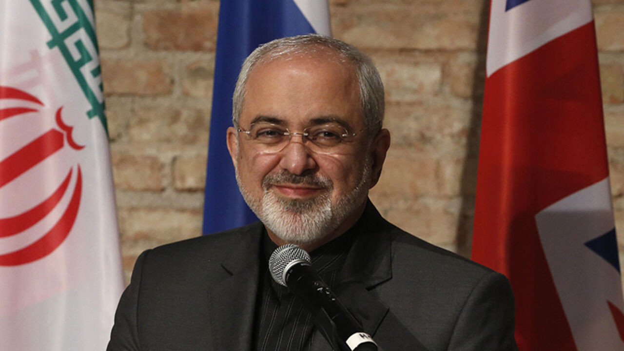 Iranian Foreign Minister Mohammad Zarif attends a news conference in Vienna Iranian Foreign Minister Mohammad Javad Zarif attends a news conference in Vienna July 18, 2014. Iran and six world powers have agreed to a four-month extension of negotiations on a nuclear deal with Tehran after failing to meet a July 20 deadline due to "significant gaps" between the two sides, the European Union and Iran said on Saturday. REUTERS/Leonhard Foeger (AUSTRIA - Tags: POLITICS) - RTR3ZAIV