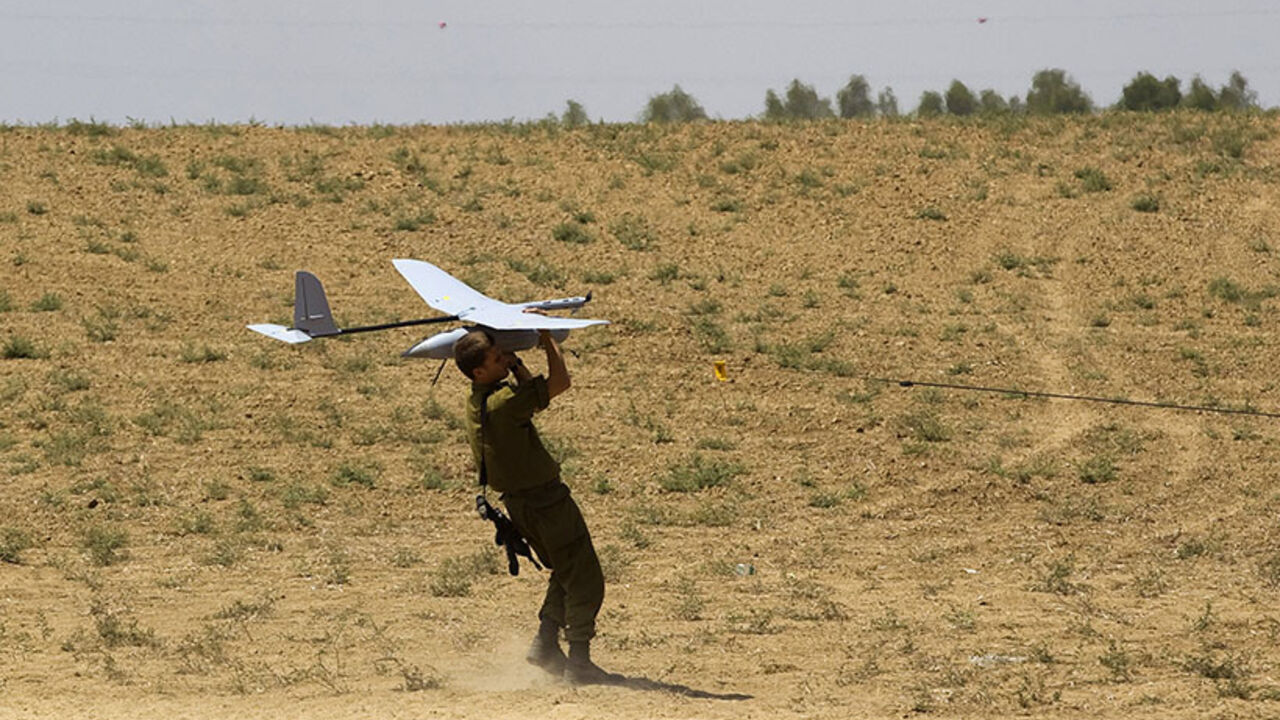 An Israeli soldier launches a Skylark unmanned vehicle near the border with Gaza An Israeli soldier launches a Skylark unmanned aerial vehicle near the border with Gaza July 21, 2014. Israeli forces killed 10 Palestinian militants who slipped across the border from Gaza through hidden tunnels on Monday, the military said, as the death toll from the two-week conflict passed 500 amid growing international calls for an end. Non-stop attacks lifted the Palestinian death toll to 496, including almost 100 children, since fighting started on July 8, Gaza health officials said. Israel says 18 o