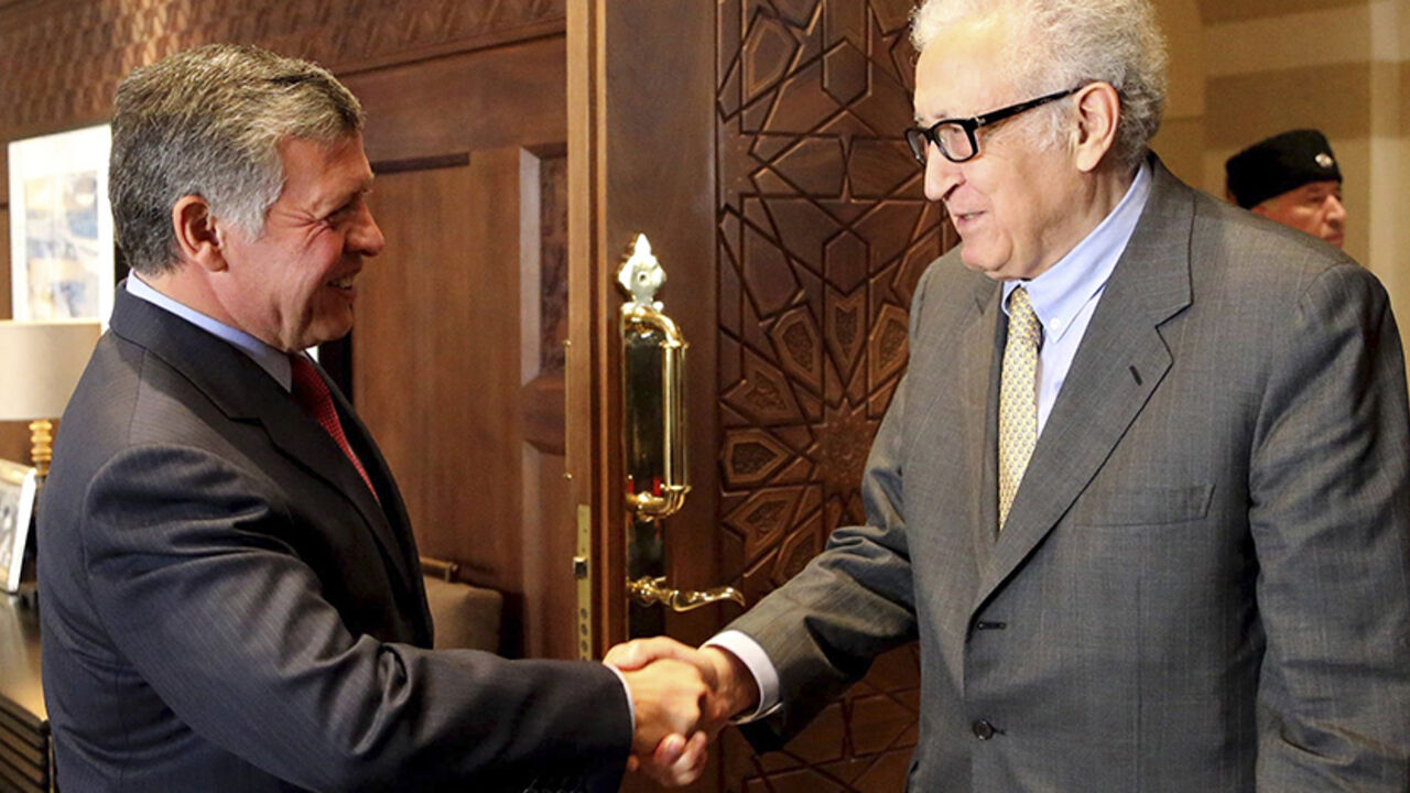 Jordan's King Abdullah shakes hands with U.N.-Arab League envoy for Syria Brahimi in Amman Jordan's King Abdullah (L) shakes hands with U.N.-Arab League envoy for Syria Lakhdar Brahimi at the Royal Palace in Amman October 23, 2013. REUTERS/Jordanian Royal Palace/Yousef Allan/Handout via Reuters (JORDAN - Tags: POLITICS ROYALS) ATTENTION EDITORS - THIS IMAGE HAS BEEN SUPPLIED BY A THIRD PARTY. IT IS DISTRIBUTED, EXACTLY AS RECEIVED BY REUTERS, AS A SERVICE TO CLIENTS. FOR EDITORIAL USE ONLY. NOT FOR SALE FOR MARKETING OR ADVERTISING CAMPAIGNS - RTX14L3R