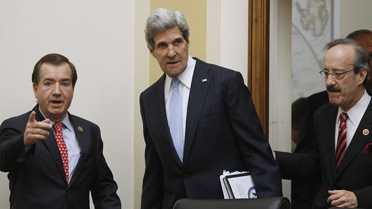 U.S. Secretary of State John Kerry arrives before giving testimony at the House Foreign Affairs Committee on Capitol Hill in Washington U.S. Secretary of State John Kerry (C) is escorted by Rep. Ed Royce (R-CA) (L), chairman of the House Foreign Affairs Committee, and Rep. Eliot Engel (D-NY) (R) before giving testimony on Capitol Hill in Washington April 17, 2013. REUTERS/Gary Cameron (UNITED STATES - Tags: POLITICS) - RTXYPB6