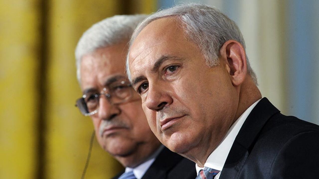 Palestinian President Abbas sits with Israeli Prime Minister Netanyahu as leaders gathered to deliver a joint statement on Middle East Peace talks at the White House Palestinian President Mahmoud Abbas (L) sits next to Israeli Prime Minister Benjamin Netanyahu, as leaders gathered to deliver a joint statement on Middle East Peace talks in the East Room of the White House in Washington September 1, 2010. REUTERS/Jonathan Ernst (UNITED STATES - Tags: POLITICS IMAGES OF THE DAY) - RTR2HTF7