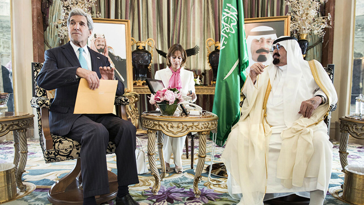 Saudi King Abdullah bin Abdulaziz al-Saud and U.S. Secretary of State John Kerry wait for a meeting at the King's private residence in the Red Sea city of Jeddah Saudi King Abdullah bin Abdulaziz al-Saud (R) and U.S. Secretary of State John Kerry wait for a meeting at the King's private residence in the Red Sea city of Jeddah June 27, 2014. Kerry arrived in Jeddah on Friday to discuss the crises in Iraq and Syria with Saudi Arabia's King Abdullah and meet Syrian opposition leader Ahmad Jarba, who has close ties to the kingdom. REUTERS/Brendan Smialowski/Pool (SAUDI ARABIA - Tags: POLITICS CIVIL UNREST) - RTR3W2PT