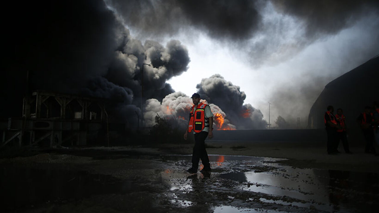 Palestinian firefighter participates in efforts to put out a fire at Gaza's main power plant, which witnesses said was hit in Israeli shelling, in the central Gaza Strip A Palestinian firefighter participates in efforts to put out a fire at Gaza's main power plant, which witnesses said was hit in Israeli shelling, in the central Gaza Strip July 29, 2014. Israeli tank fire hit the fuel depot of the Gaza Strip's only power plant on Tuesday, witnesses said, cutting electricity to Gaza City and many other parts of the Palestinian enclave of 1.8 million people.An Israeli military spokeswoman had no immediate comment and said she was checking the report. Israel launched its Gaza