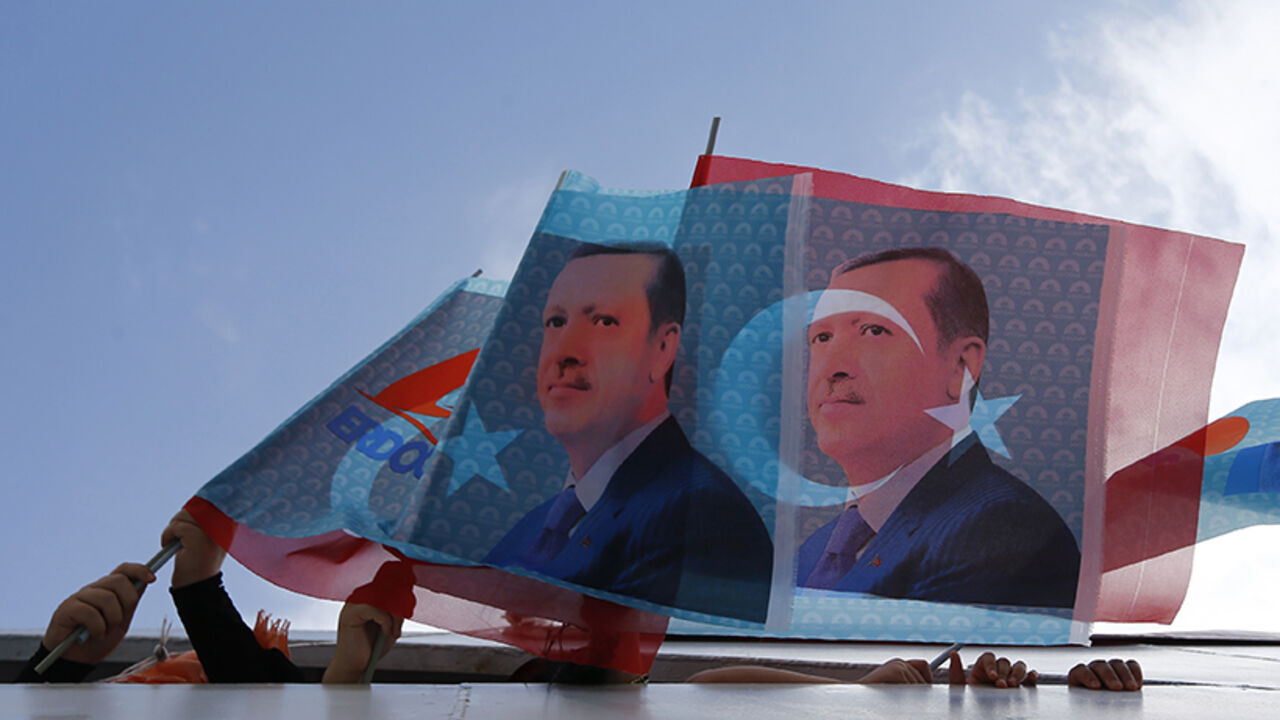 Supporters of Turkey's Prime Minister and presidential candidate Tayyip Erdogan wave flags in a boat on their way to an election rally in Istanbul Supporters of Turkey's Prime Minister and presidential candidate Tayyip Erdogan wave flags in a boat on their way to an election rally in Istanbul August 3, 2014. Cheers erupted from the packed stands when Erdogan scored his third goal in a celebrity soccer match to mark the opening of an Istanbul stadium. His orange jersey bore the number 12, a reminder of Erdogan's ambition to become the nation's 12th president in Turkey's first popular vote for its head of state, on Aug. 10. After dominating Turkish poli