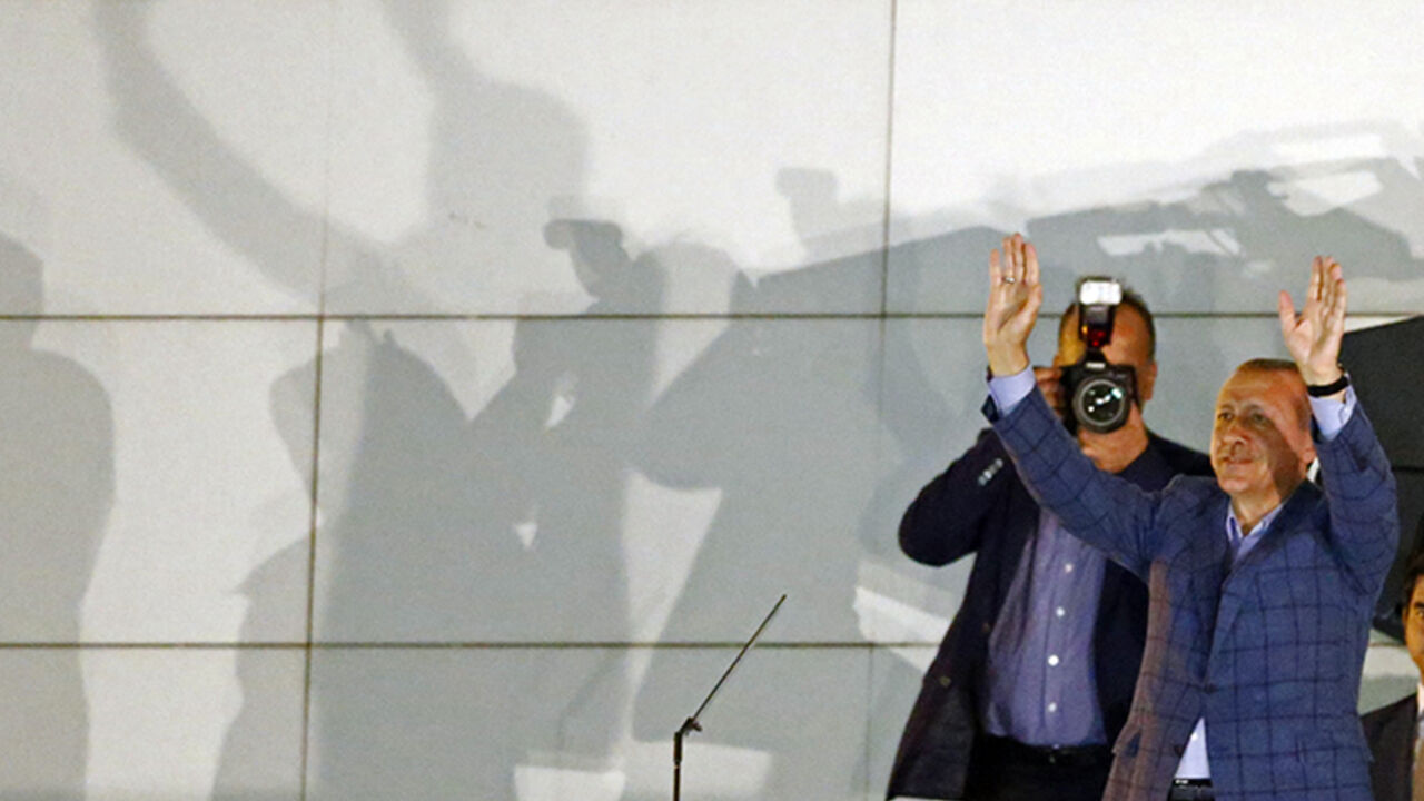 Turkey's Prime Minister Erdogan gestures as he celebrates his election victory in front of the party headquarters in Ankara Turkey's Prime Minister Tayyip Erdogan gestures as he celebrates his election victory in front of the party headquarters in Ankara August 10, 2014. Erdogan secured his place in history as Turkey's first directly elected president on Sunday, sweeping more than half the vote in a result his opponents fear heralds an increasingly authoritarian state. REUTERS/Murad Sezer (TURKEY - Tags: POLITICS ELECTIONS) - RTR41W60