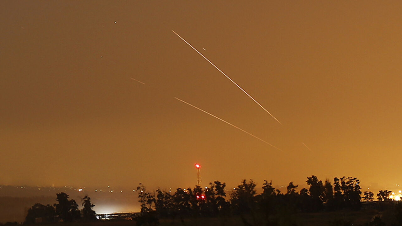 Light streaks and trails are seen as rockets are launched from Gaza towards Israel before a 72-hour cease fire was due to expire Light streaks and trails are seen as rockets are launched from Gaza towards Israel before a 72-hour cease fire was due to expire August 13, 2014. At least two rockets fired from the Gaza Strip struck Israel on Wednesday, moments before a three-day truce was set to expire, police said. Spokesman Micky Rosenfeld said two rockets landed in open areas causing no damage or casualties. The attacks occurred as Palestinians announced agreement to extend a truce expiring at 2100 gmt Wednesday for another five days.